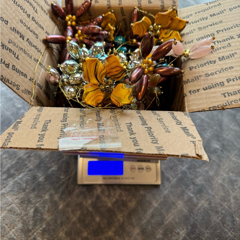 Bulk of Handcrafted Beaded Flowers for crafts decor